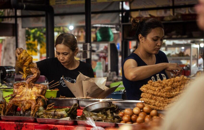 street food vendors dishing up food at the night market